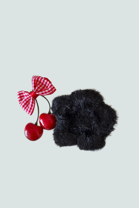 Gancho flor de peluche negro - accesorio elegante y suave